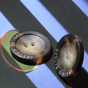 Branded buttons designed for fashion and apparel detailing