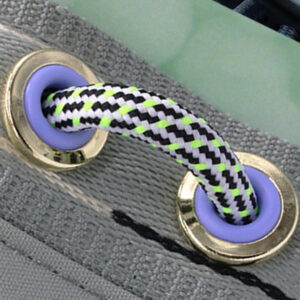 Colour-accent eyelets used with woven drawcord detailing