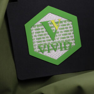 Layered logo heat transfer applied to garment fabric