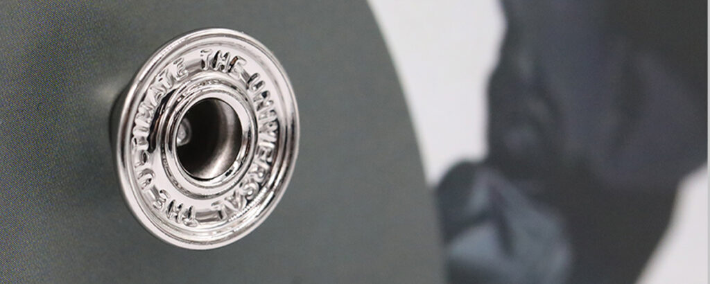 Jeans button manufacturer showcasing metal trim detail for denim production